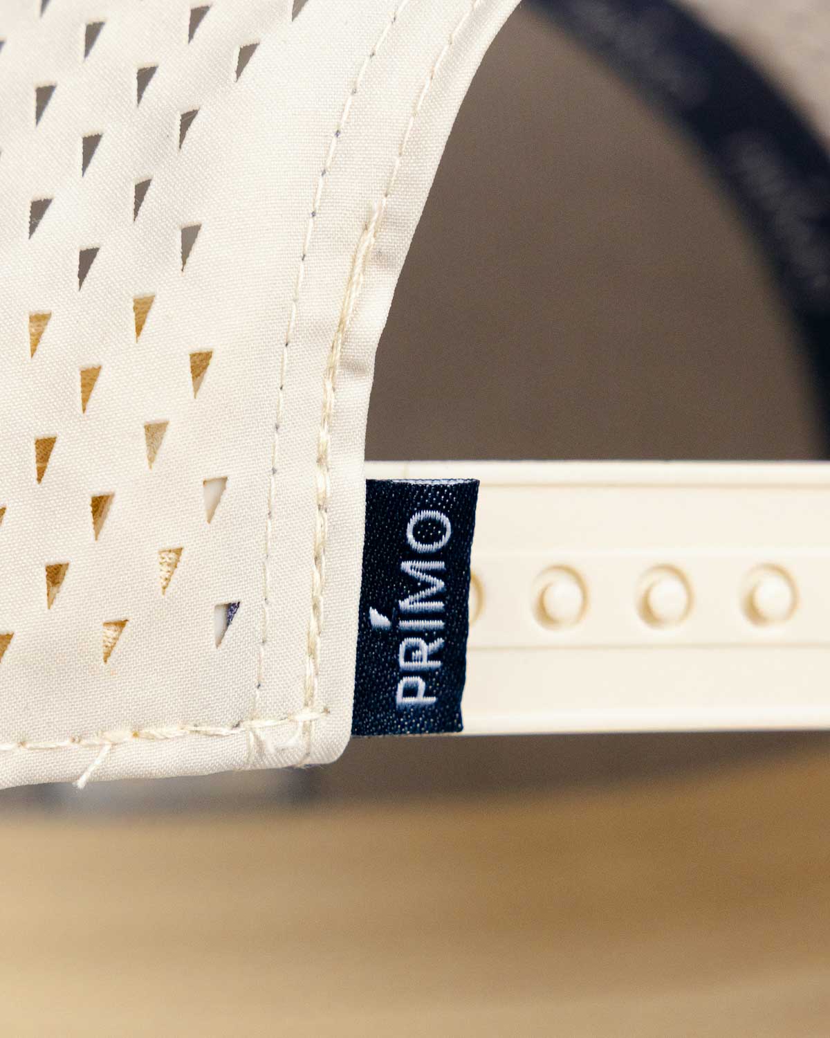 Primo Golf Hat Cream Navy — snapback closure with Primo label