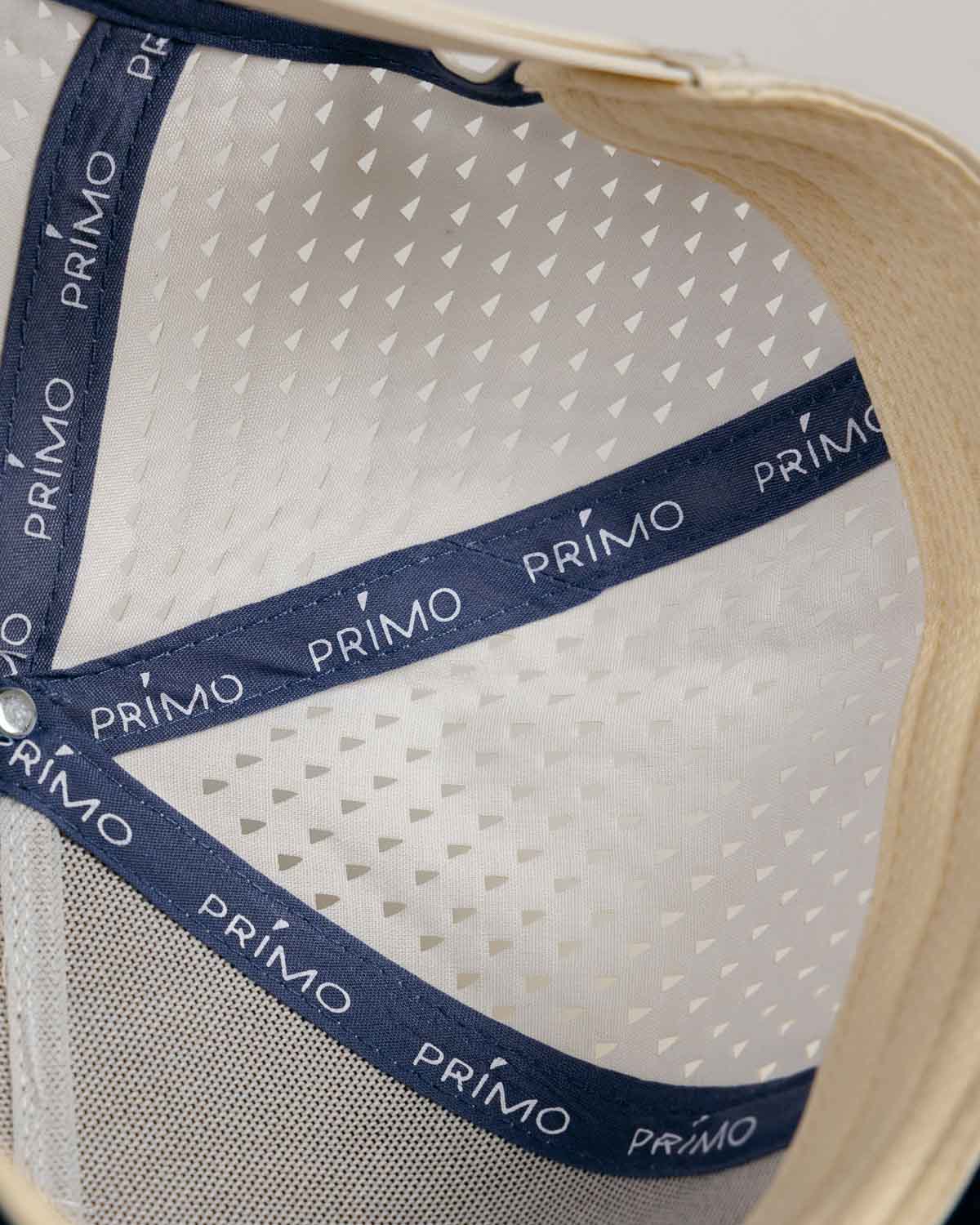 Primo Golf Hat Cream Navy — interior Primo branded lining