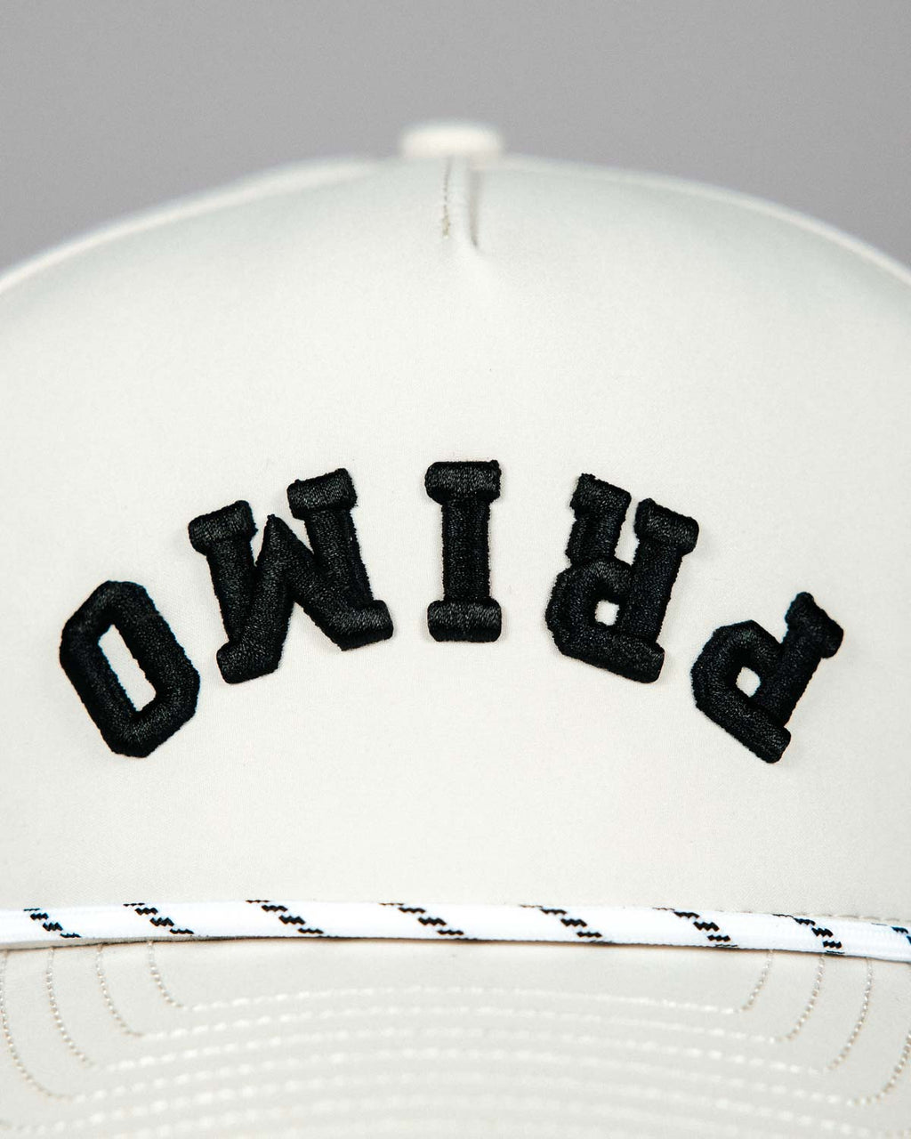 Primo Upside Down Hat Cream — angled front view with rope brim detail