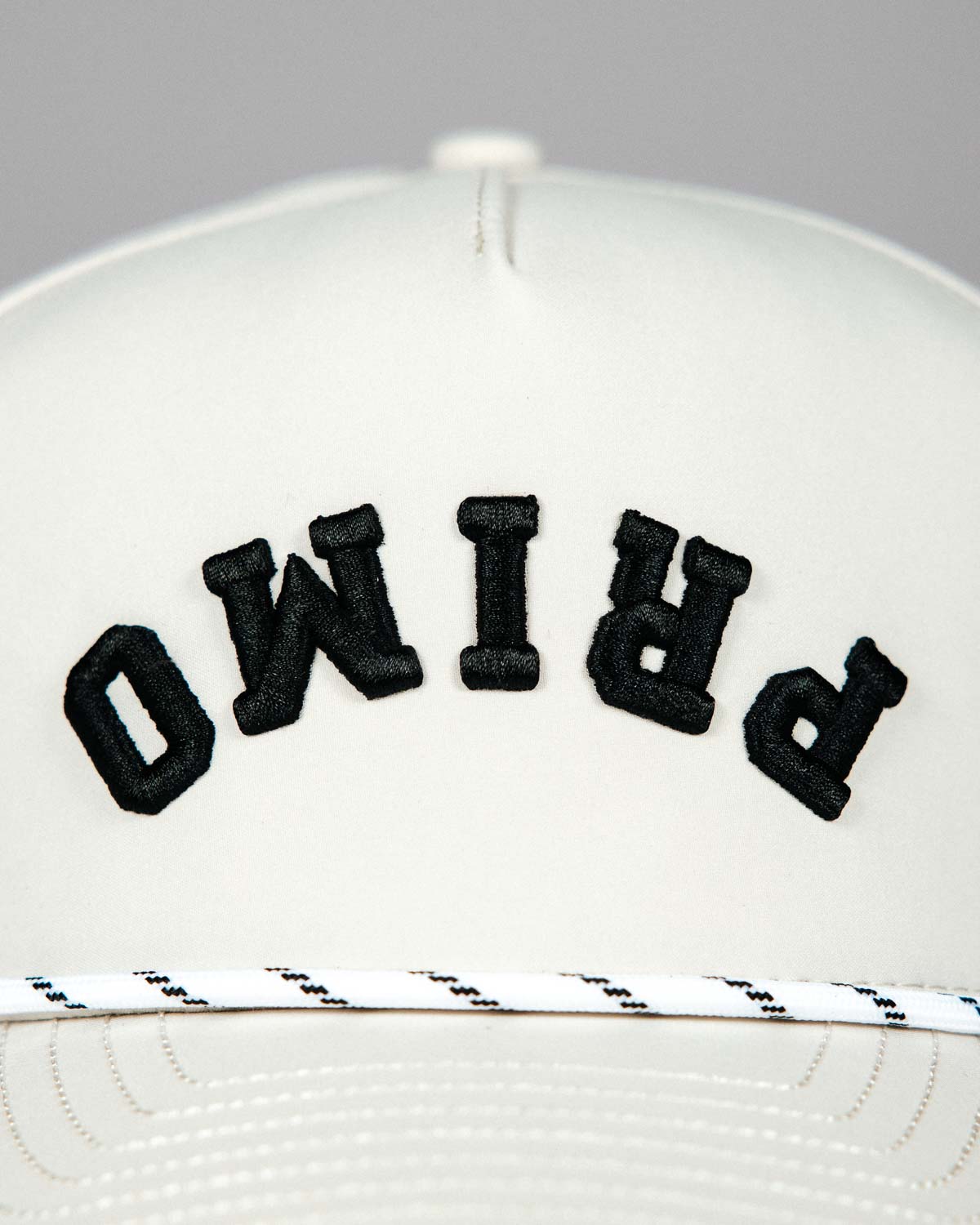 Primo Upside Down Hat Cream — angled front view with rope brim detail